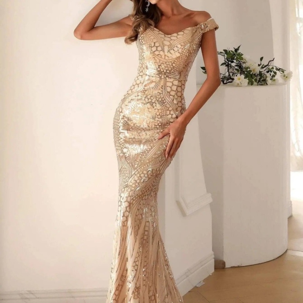 Miss Ord gold sequin gown